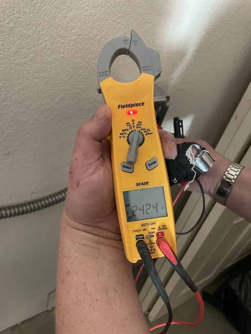 Voltage testing with clamp meter during Aluminum Wiring Replacement in Sunbury